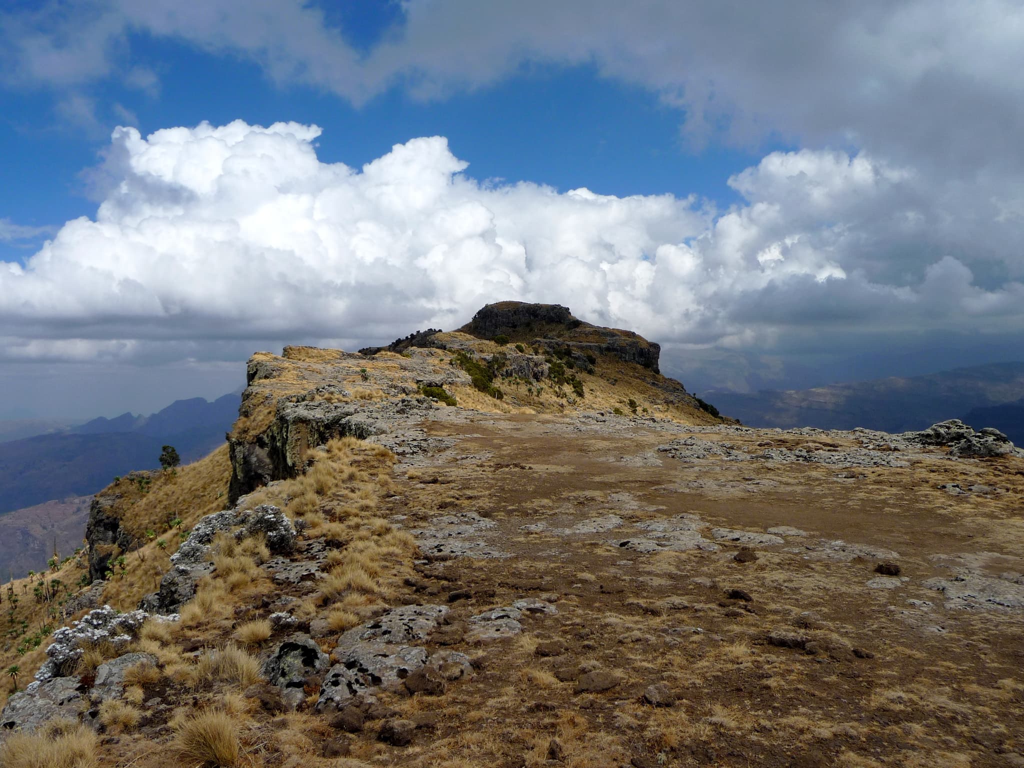 The rocky viewpoint and deep valleys at Imet Gogo